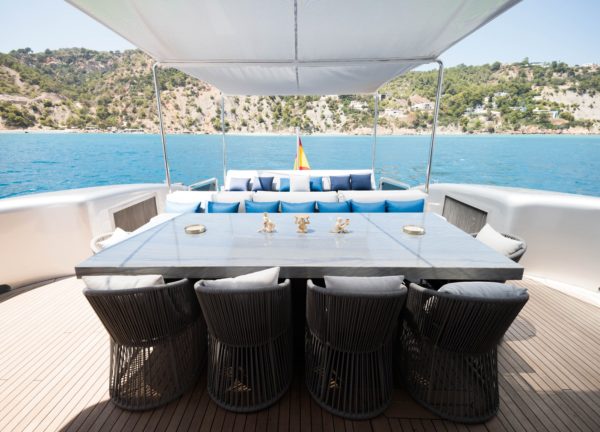 luxury yacht tecnomar 120 blue dining table